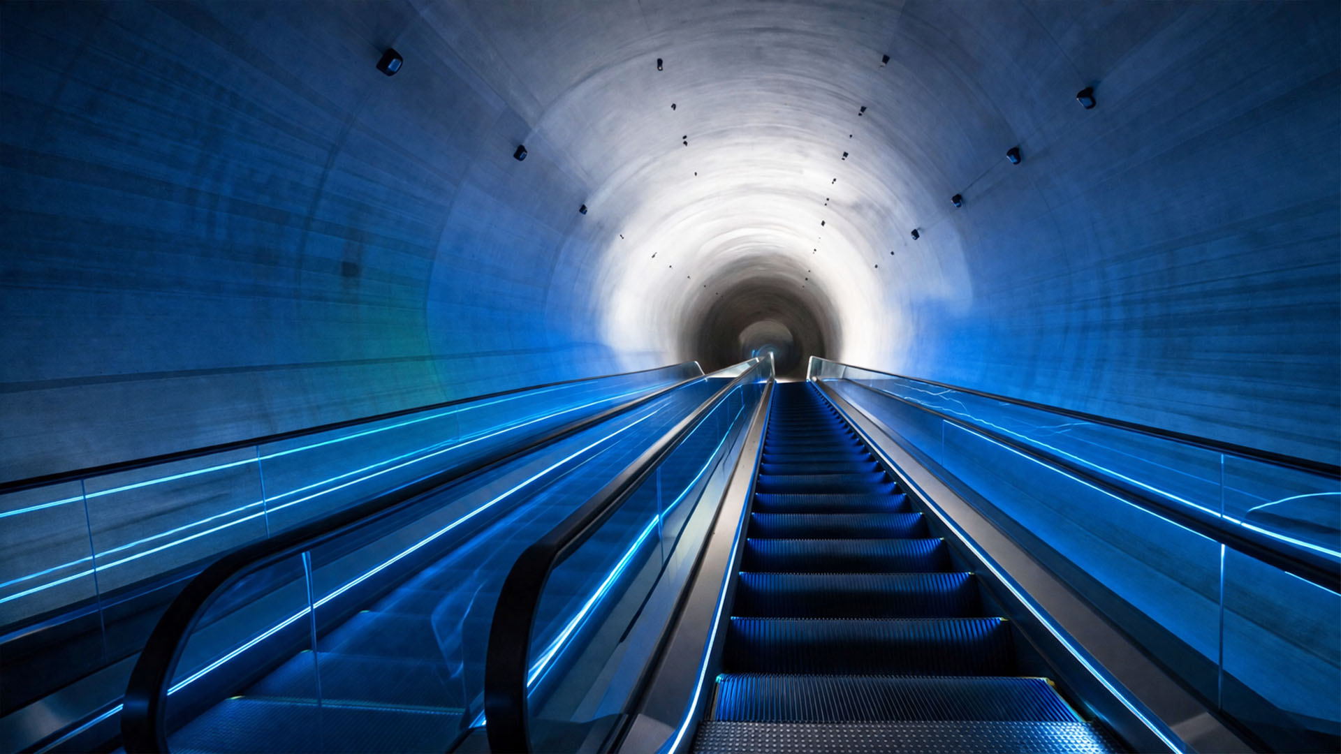 Following The Long Escalator Path Within Museum Tunnel Interior China