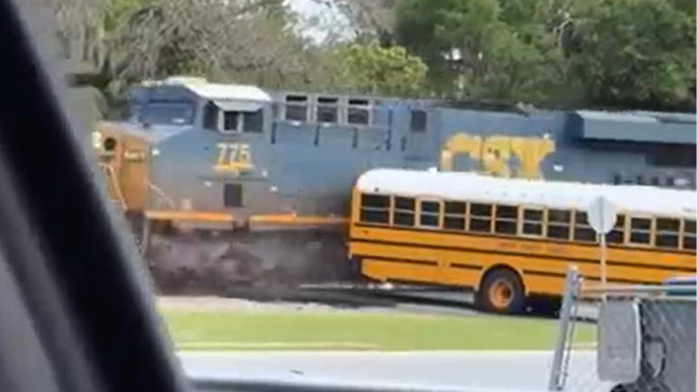 School bus driver arrested after narrowly escaping train by inches
