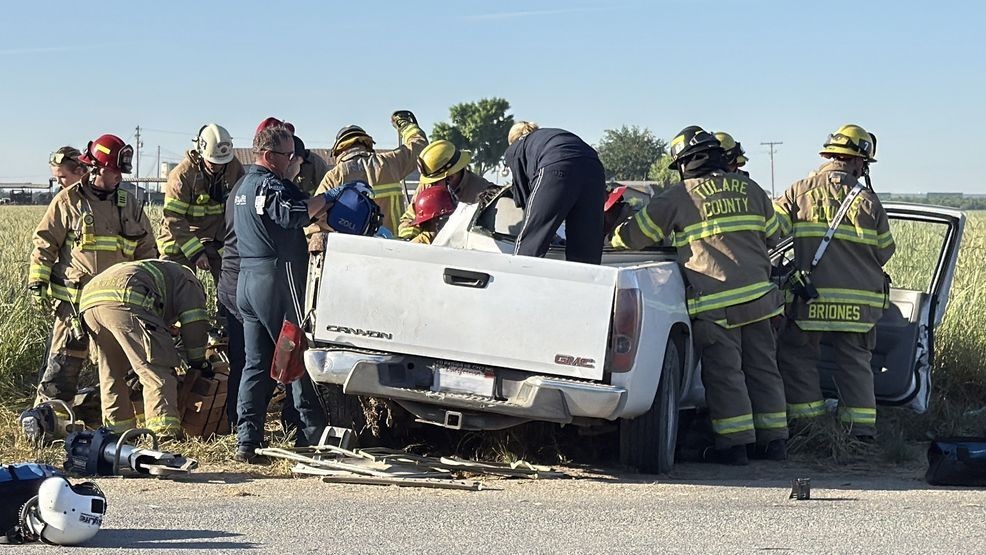 Driver trapped after crash into pole in Tulare County