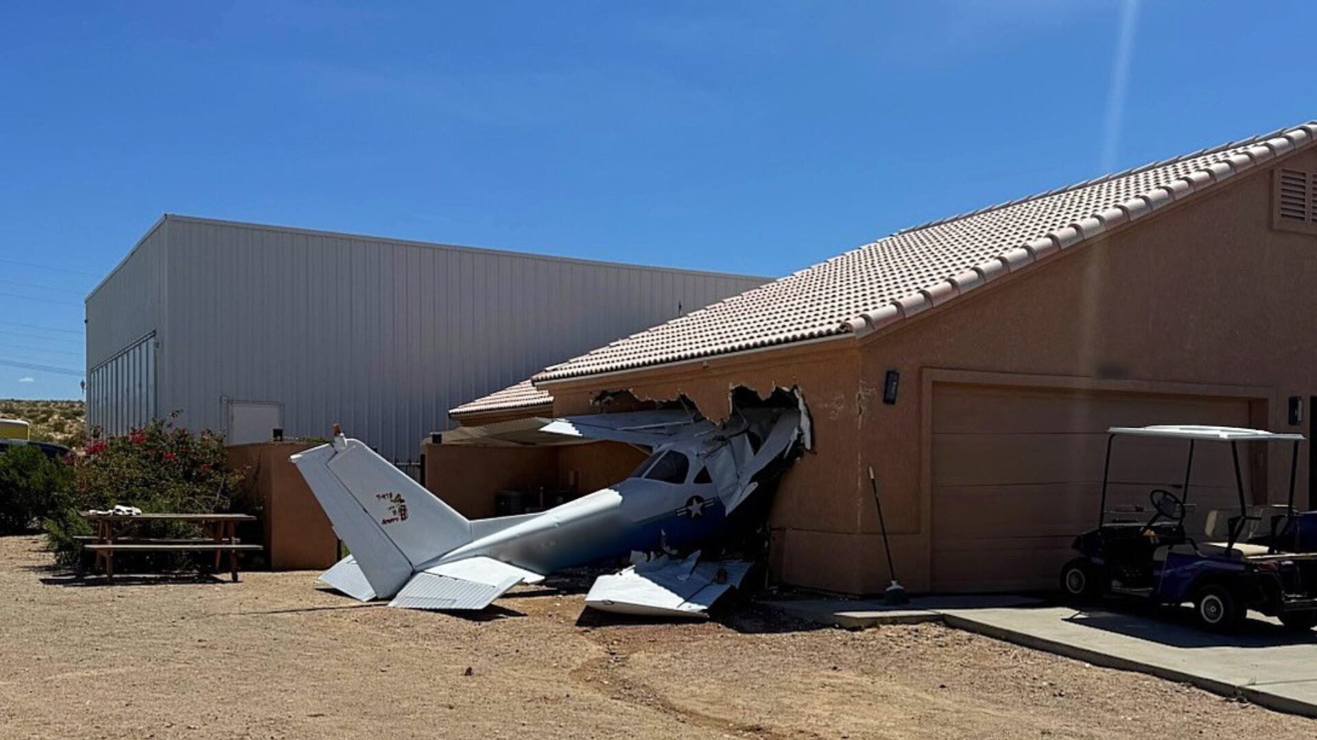 Small plane crashes into home near airport in northwest Arizona