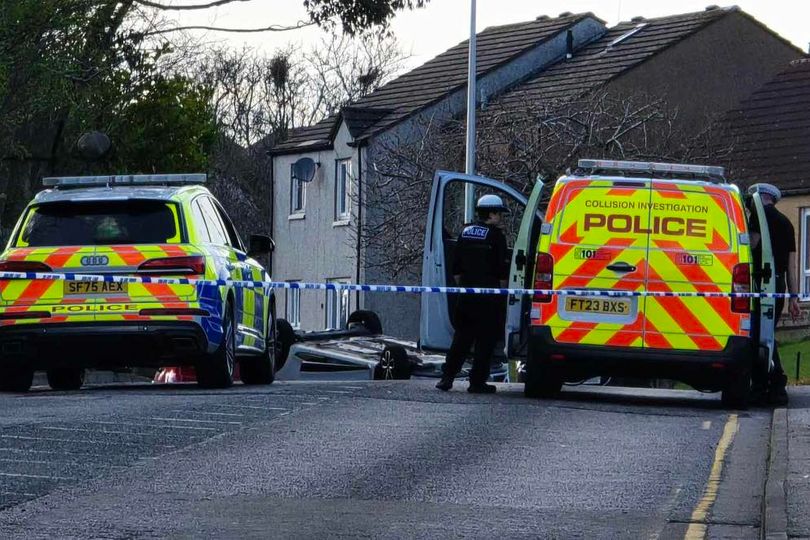 Car flips onto roof in multi-vehicle crash as three people rushed to ...