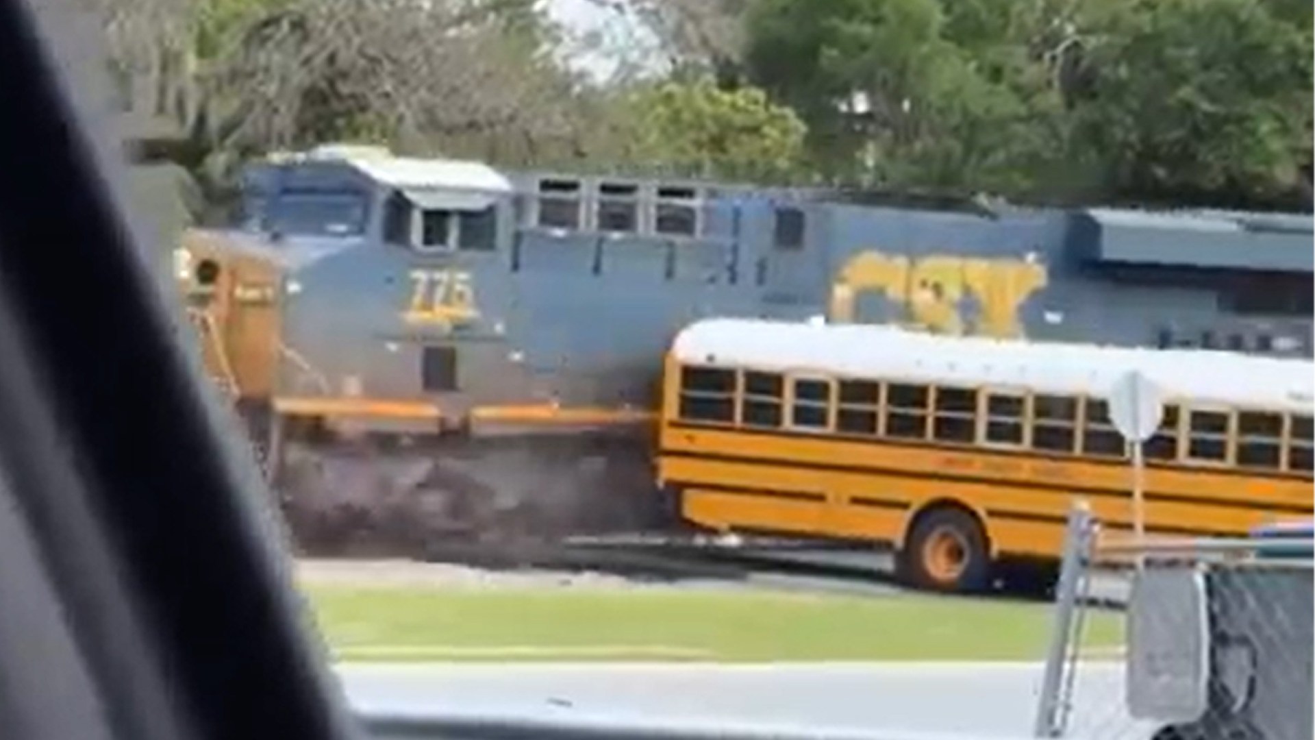 School bus driver arrested after narrowly escaping train by inches