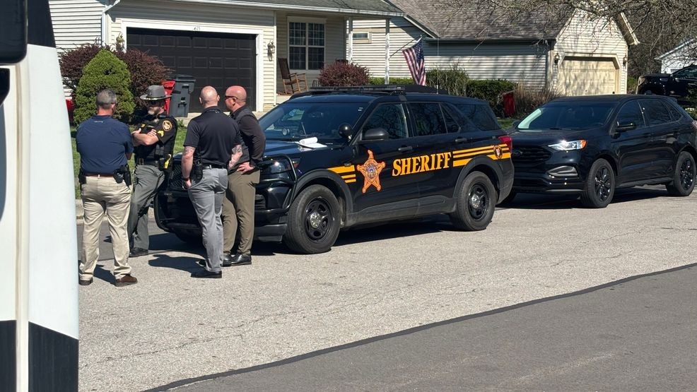 High school locked down after student arrives with stab wound; suspect held