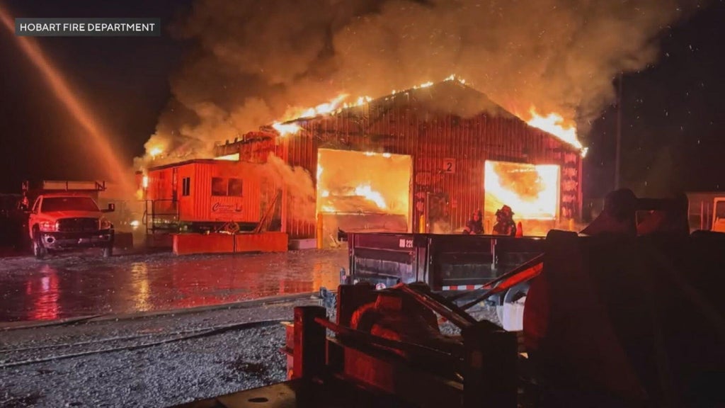 Fire engulfs garage filled with propane tanks, other hazards in Hobart ...