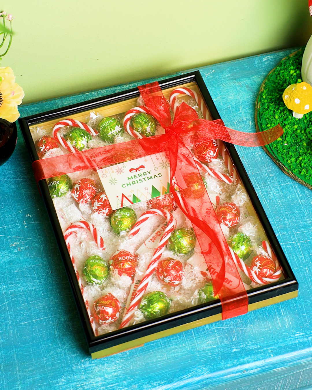 Create a Christmas box packed with goodies🍬🎁