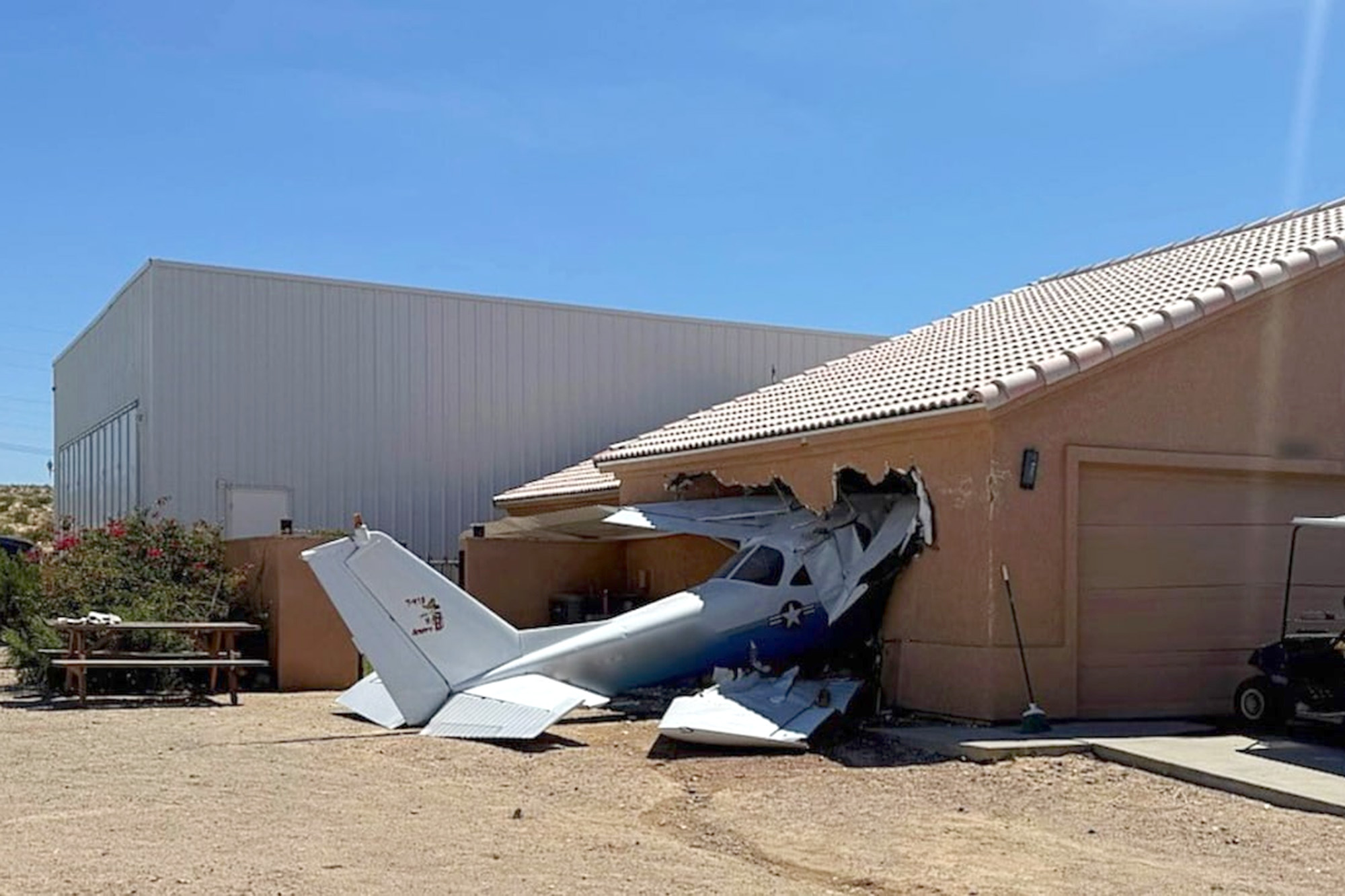 Small plane crashes into side of Arizona home after veering off airport ...