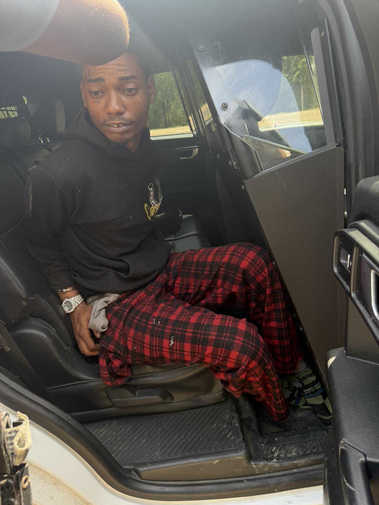Man wanted for carjacking arrested after chase in stolen SUV