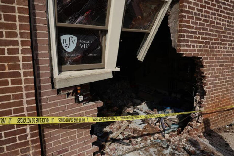 Car headed to strip club crashes into Avondale violin shop