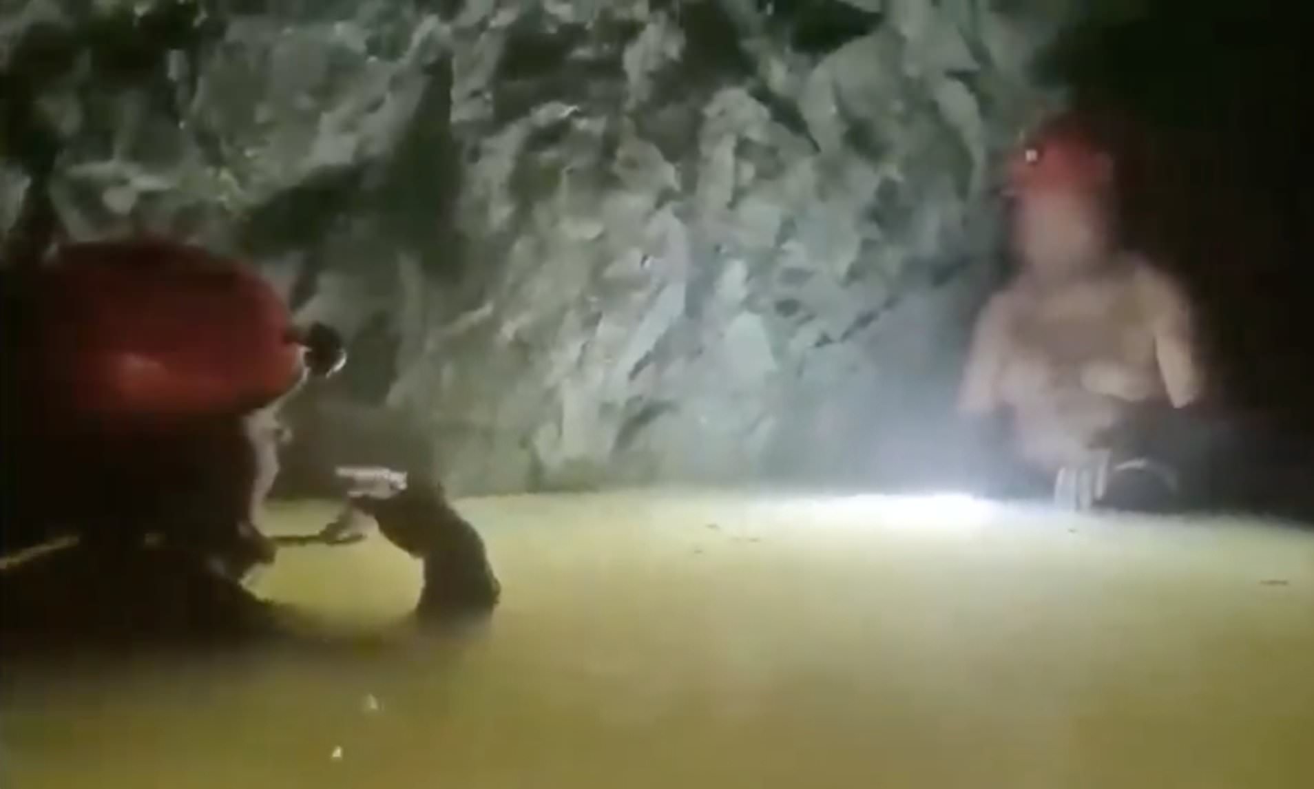 Miraculous moment miner is rescued from flooded cave 14 days after ...