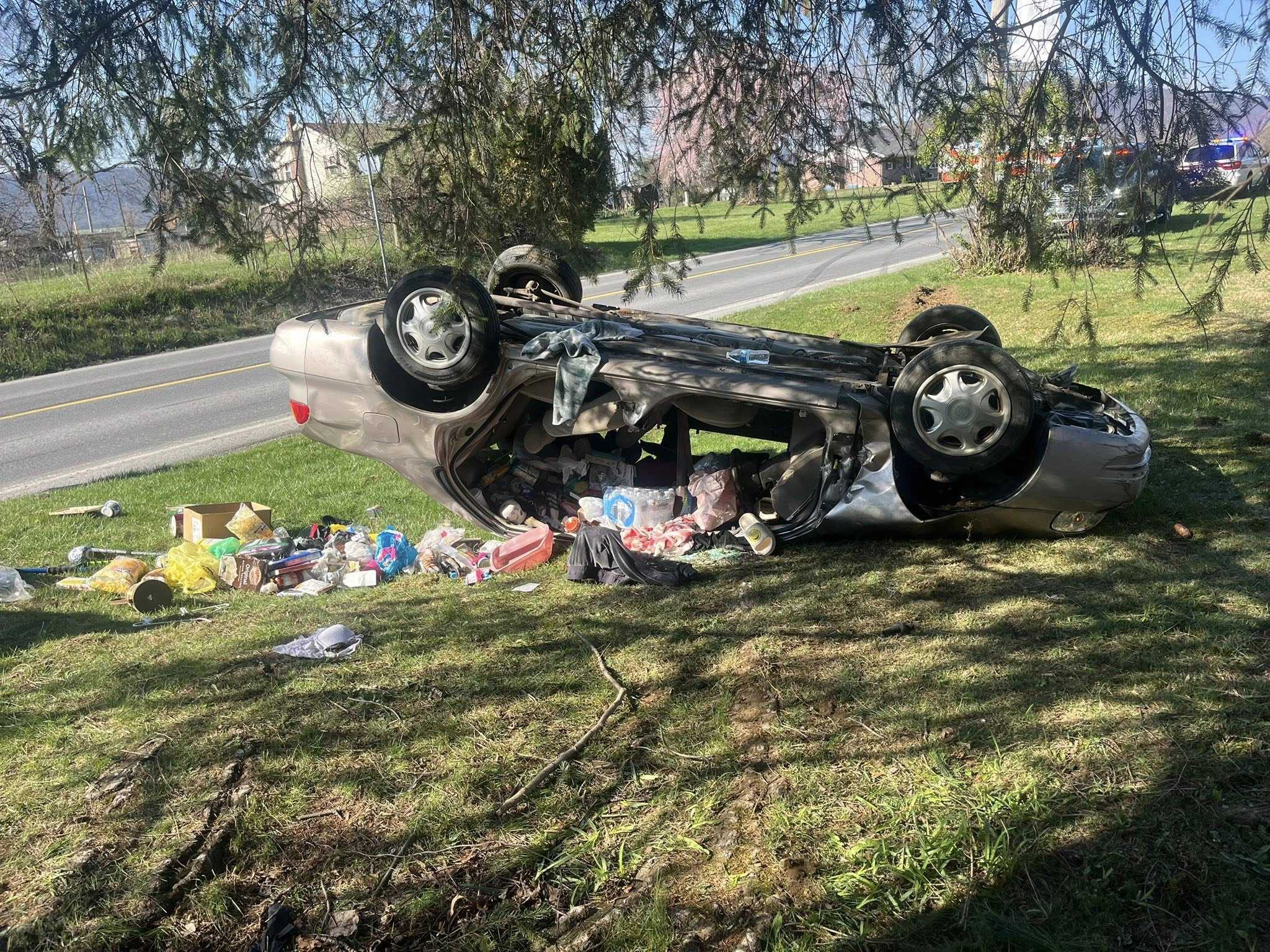 Person flown to hospital after being trapped inside overturned car