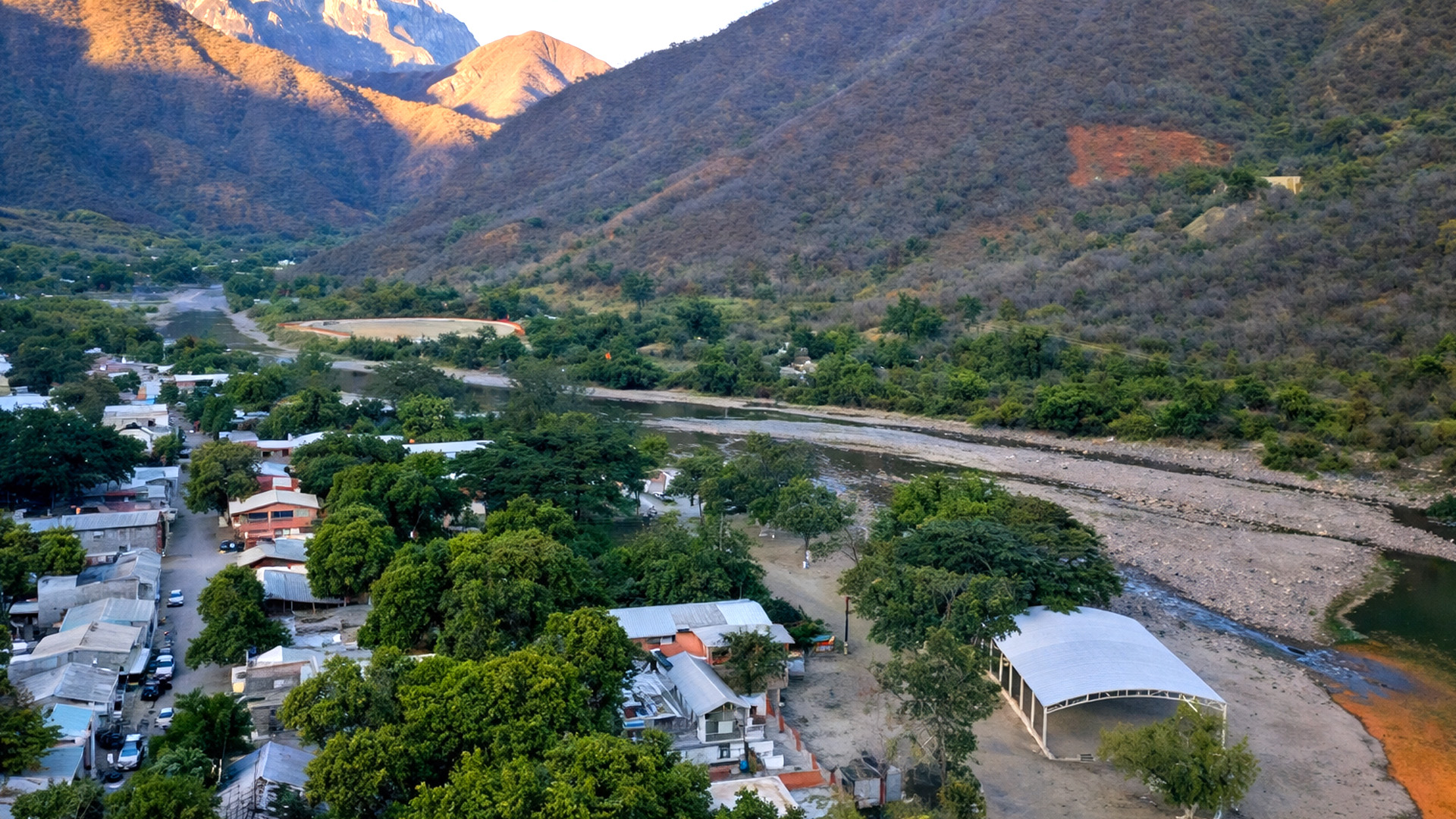 A riverside town hidden inside a massive canyon