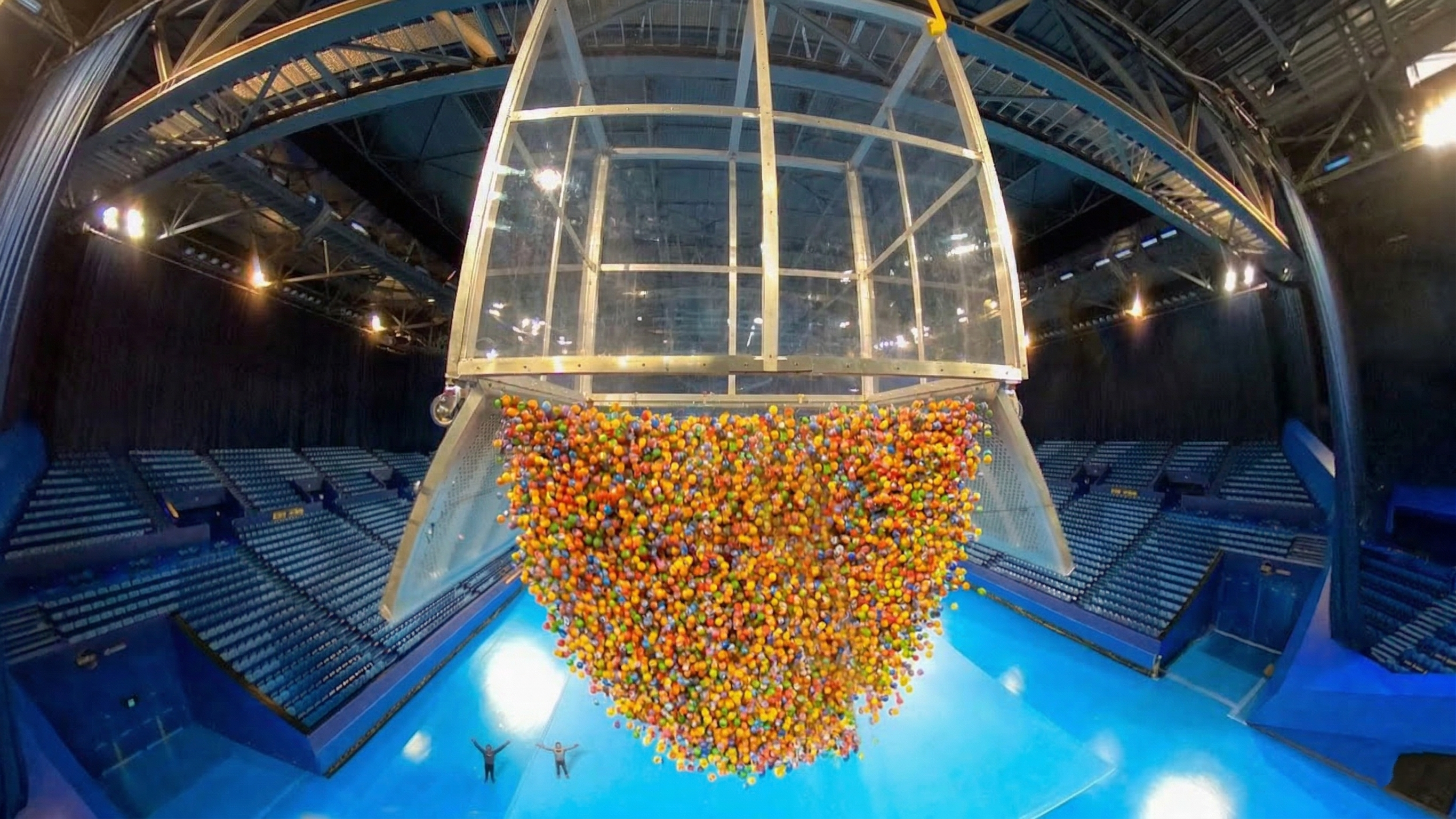Watch what happens when 100,000 bouncy balls are dropped at once