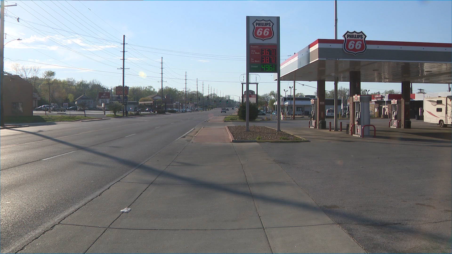 Woman charged in gas station double shooting