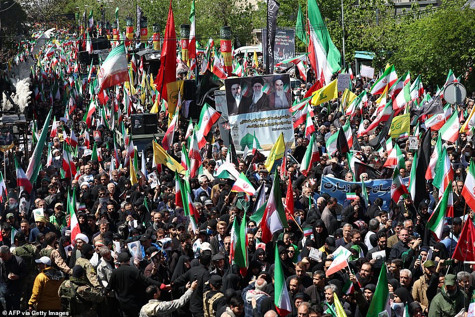 Iran holds victory parade as ceasefire falls apart