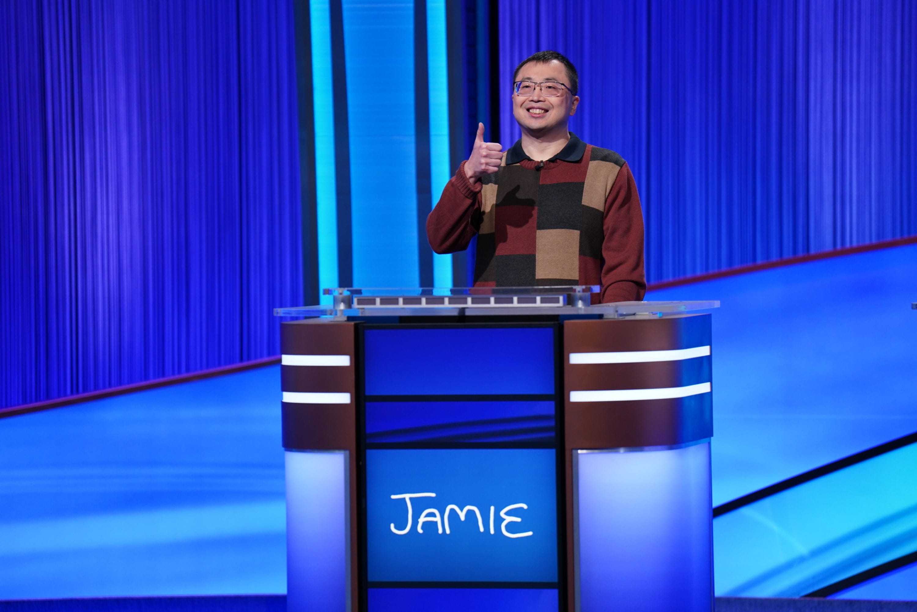 "Jeopardy!" contestant Jamie Ding is pictured at the podium while playing.
