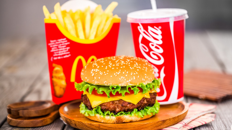 McDonald's burger with tomato drink and fries