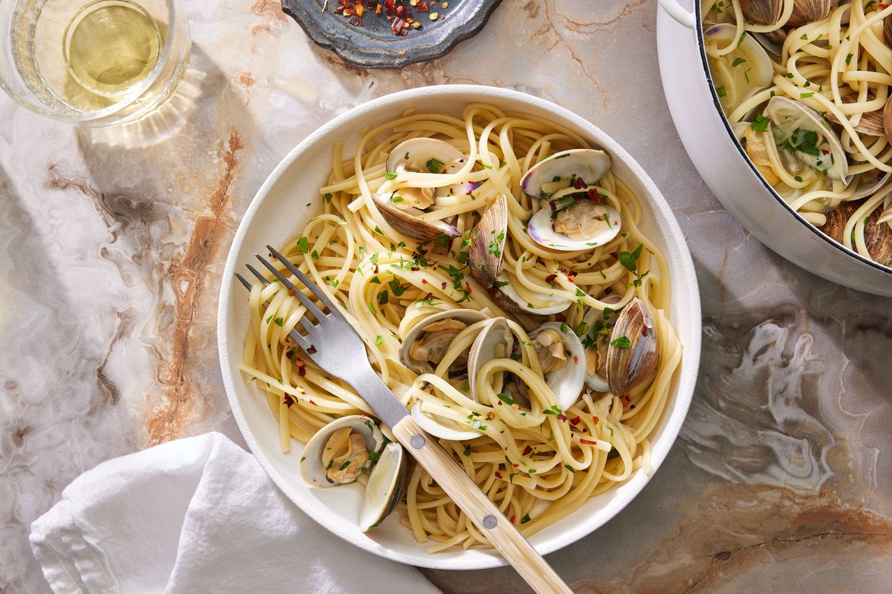 Southern Living Linguine with Clams in a bowl to serve with a glass of white wine