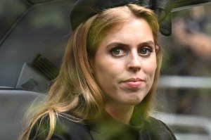 Princess Beatrice of York follows the coffin of Queen Elizabeth II, draped in the Royal Standard, as it travels on the State Gun Carriage of the Royal Navy, from Westminster Abbey to Wellington Arch September 19, 2022 in London, England. Elizabeth Alexandra Mary Windsor was born in Bruton Street, Mayfair, London on 21 April 1926. She married Prince Philip in 1947 and ascended the throne of the United Kingdom and Commonwealth on 6 February 1952 after the death of her Father, King George VI. Queen Elizabeth II died at Balmoral Castle in Scotland on September 8, 2022, and is succeeded by her eldest son, King Charles III. (Photo by Paul Ellis - WPA Pool/Getty Images)