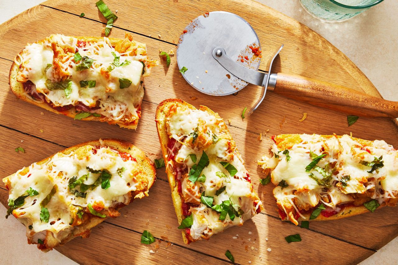 Southern Living Chicken Parmesan Pizza cut and ready to serve