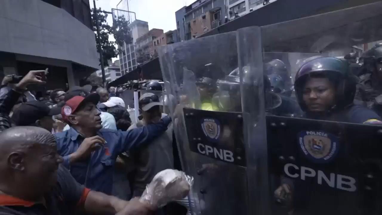 Venezuelan police block protesters demanding higher wages and pensions
