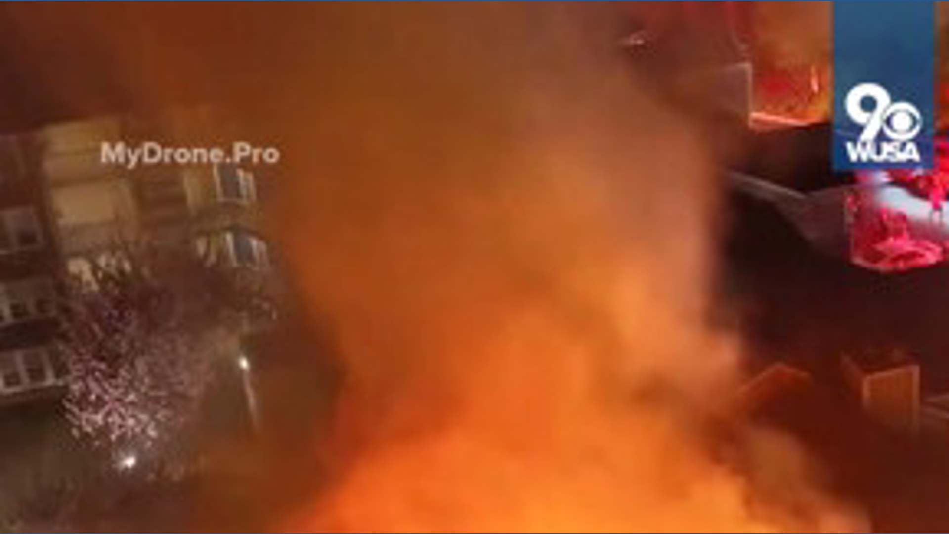 Firefighters rescue person from top floor of apartment during 2-alarm fire