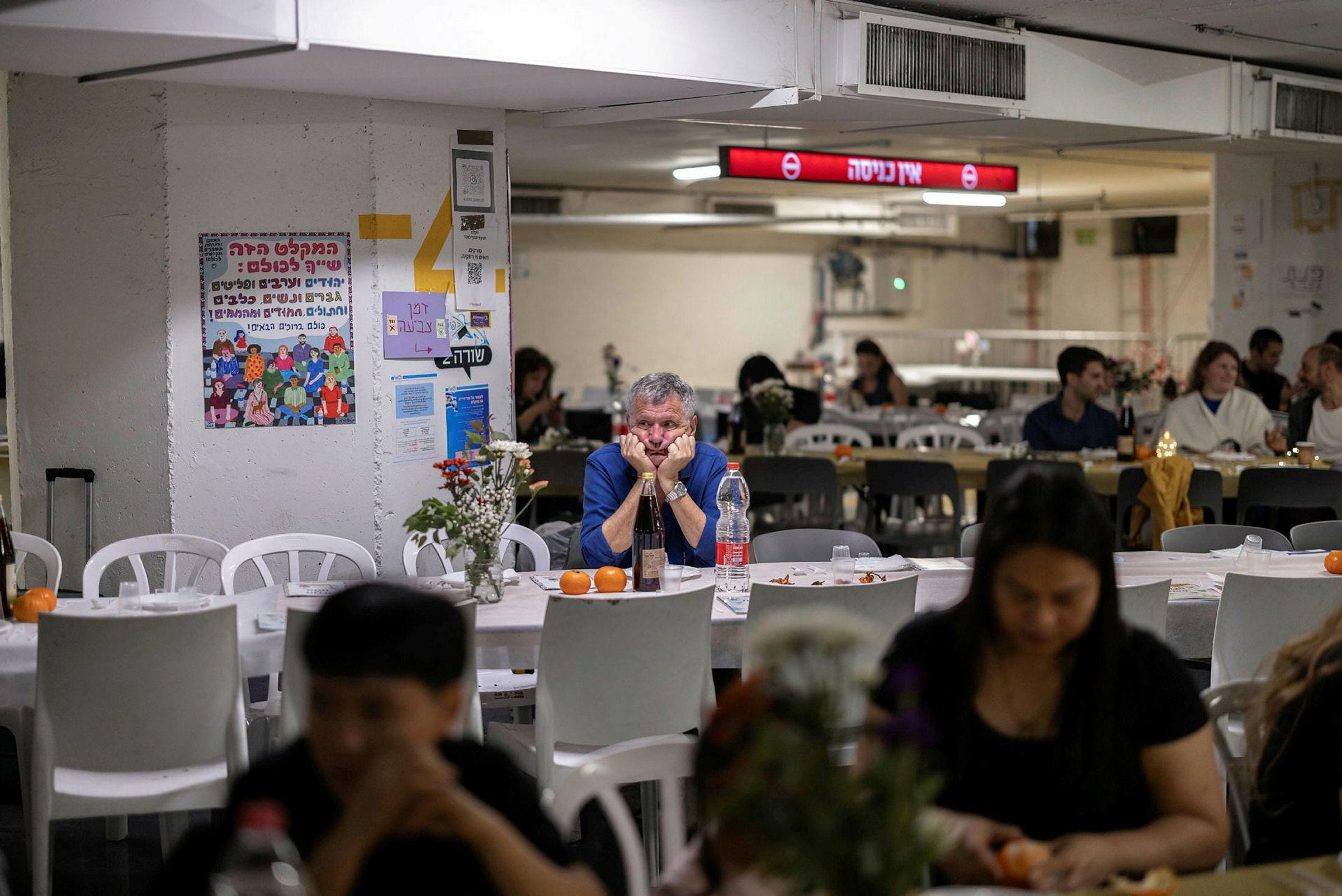 Israelis gather in a public shelter to celebrate the Passover Seder, Tel Aviv, April. Credit: Itai Ron