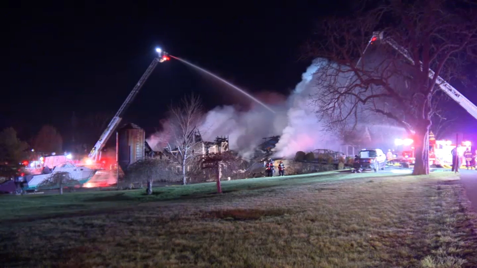 Massive fire burns through Bridgewater home