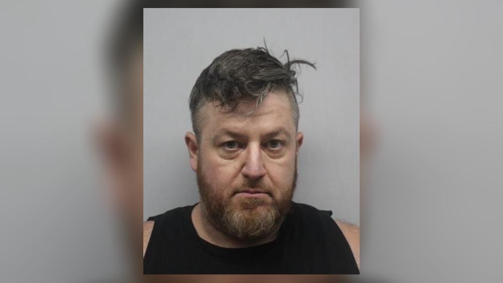 Officers, US Marshals arrest man accused of stealing gun from area home