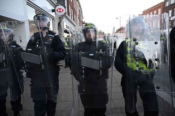 Epsom protesters confront riot police over rape suspects: 'We just want ...