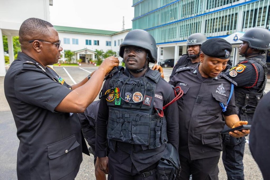 IGP Yohuno promotes police officers in Tema MoMo robbery response
