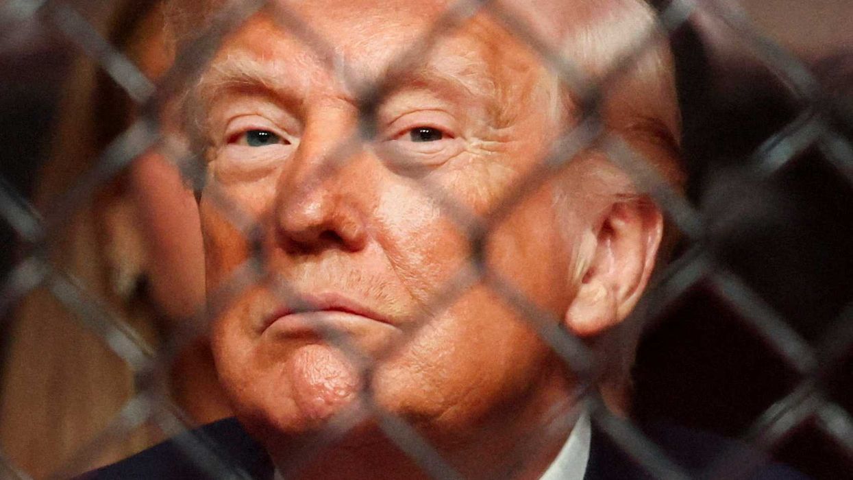 U.S. President Donald Trump watches a match during the UFC 327 event at Kaseya Center in Miami, Florida, U.S., April 11, 2026. REUTERS/Kevin Lamarque TPX IMAGES OF THE DAY