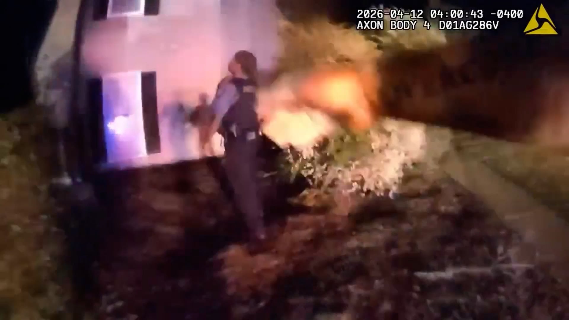 Police catch children after mother drops them from burning apartment window