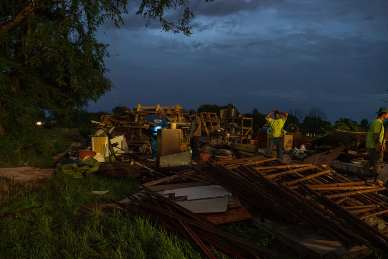 Photos: Cleanup efforts underway hours after tornado hits Clinton
