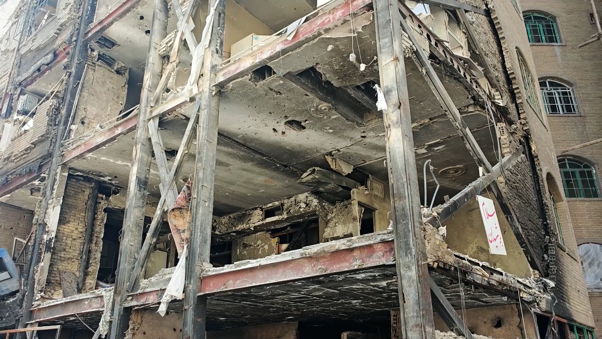 Scene of destruction at residential building struck in Tehran
