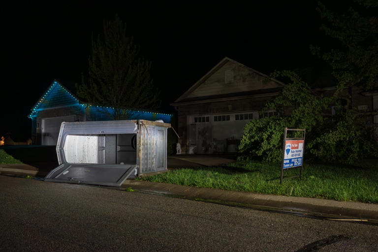 Photos: Cleanup efforts underway hours after tornado hits Clinton