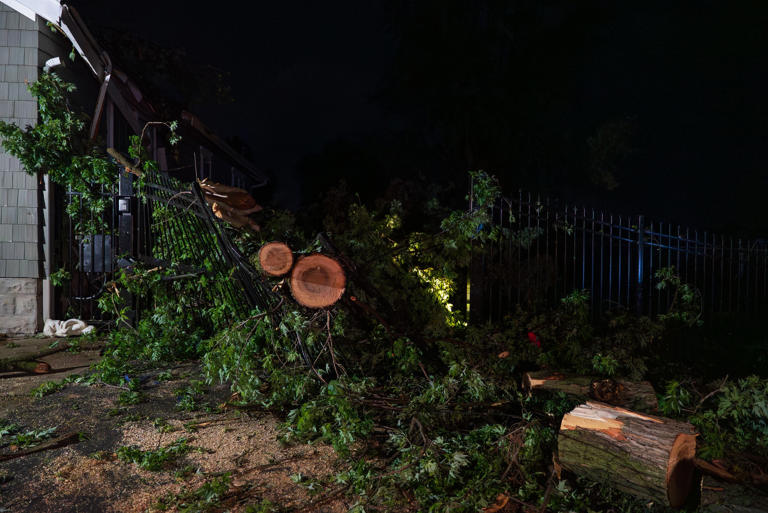 Photos: Cleanup efforts underway hours after tornado hits Clinton