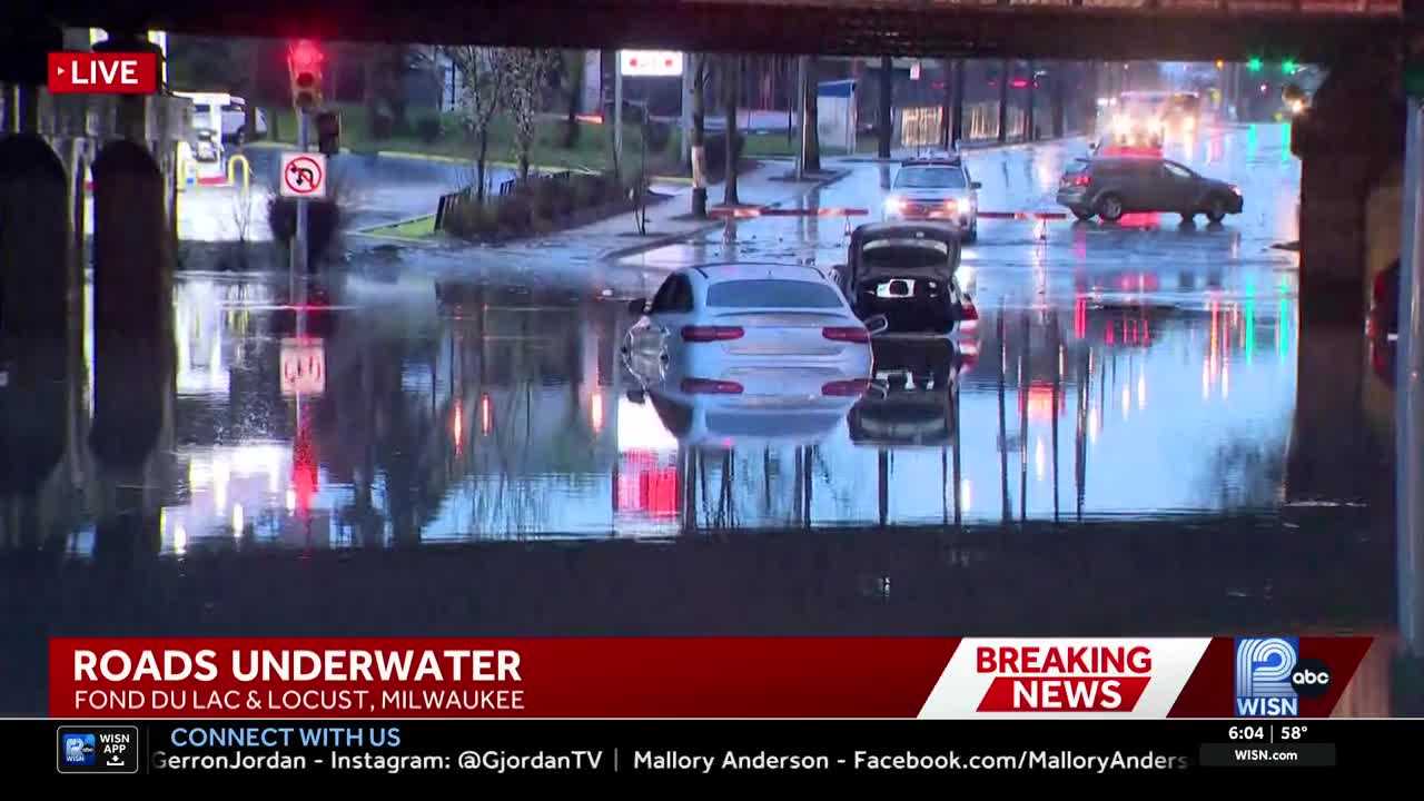 Heavy flooding submerges Milwaukee roads and stalls vehicles