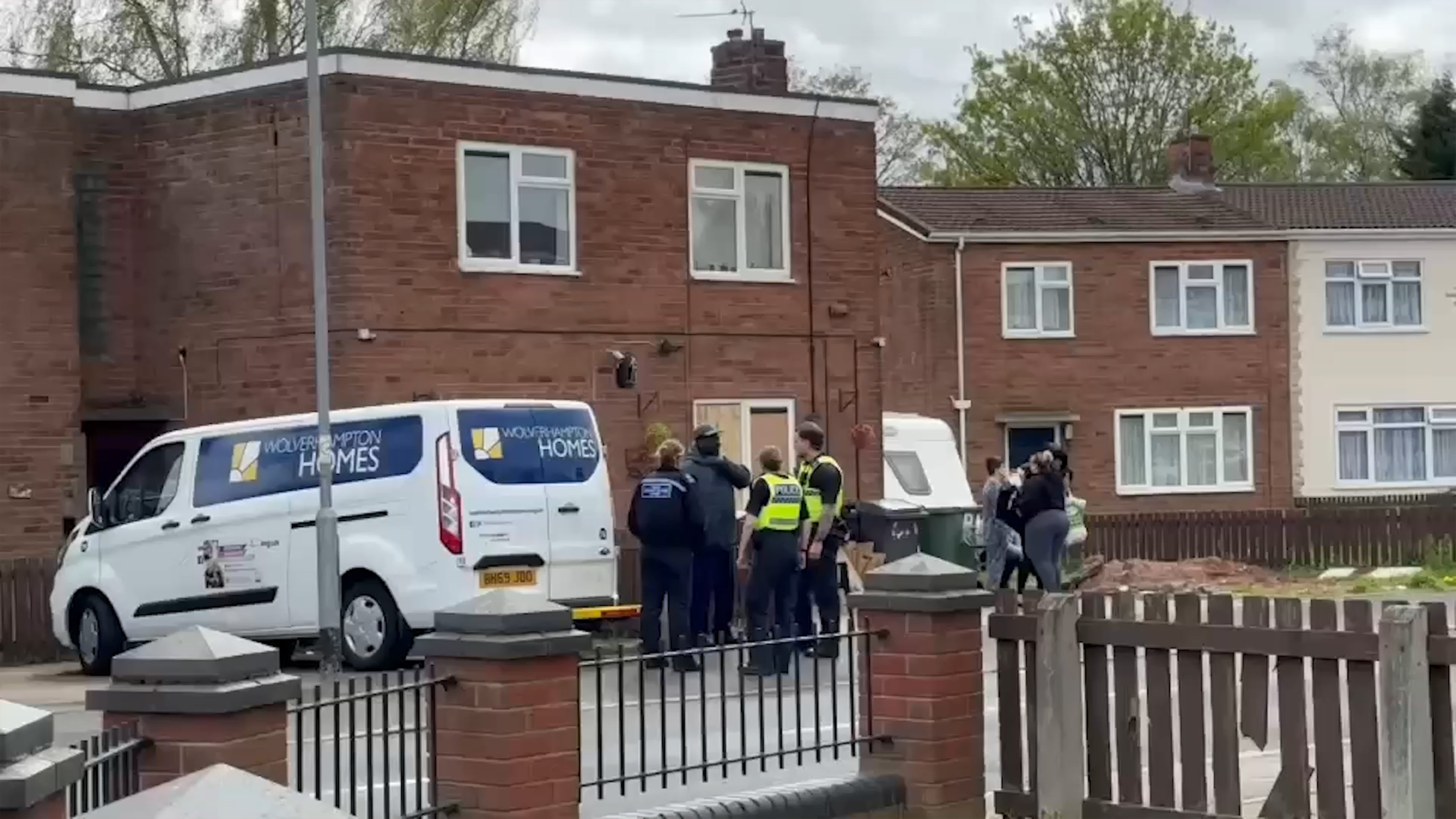 Woman, aged in her 70s, dies after being attacked by two dogs at house