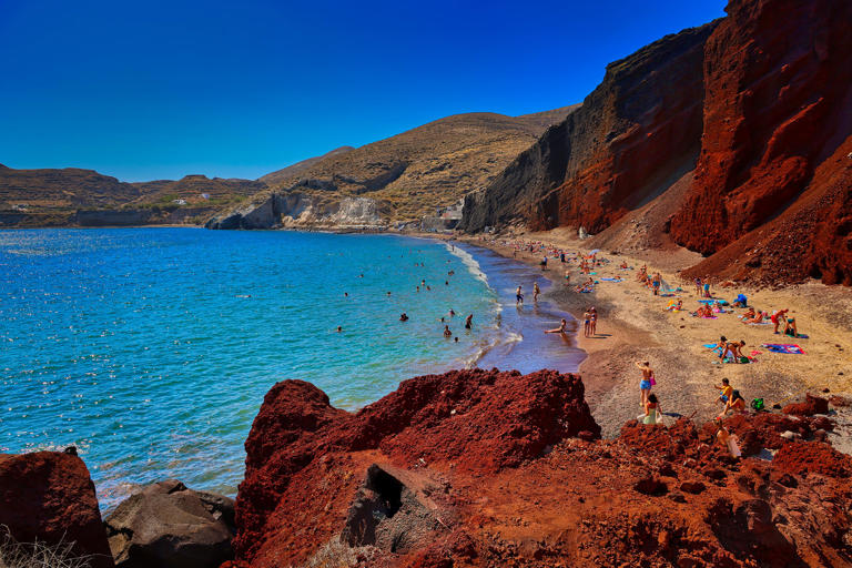Red Beach, Santorini, Cyclades, Greece — the volcanic shoreline more than lives up to its name © Getty Images Plus / George Cotayo