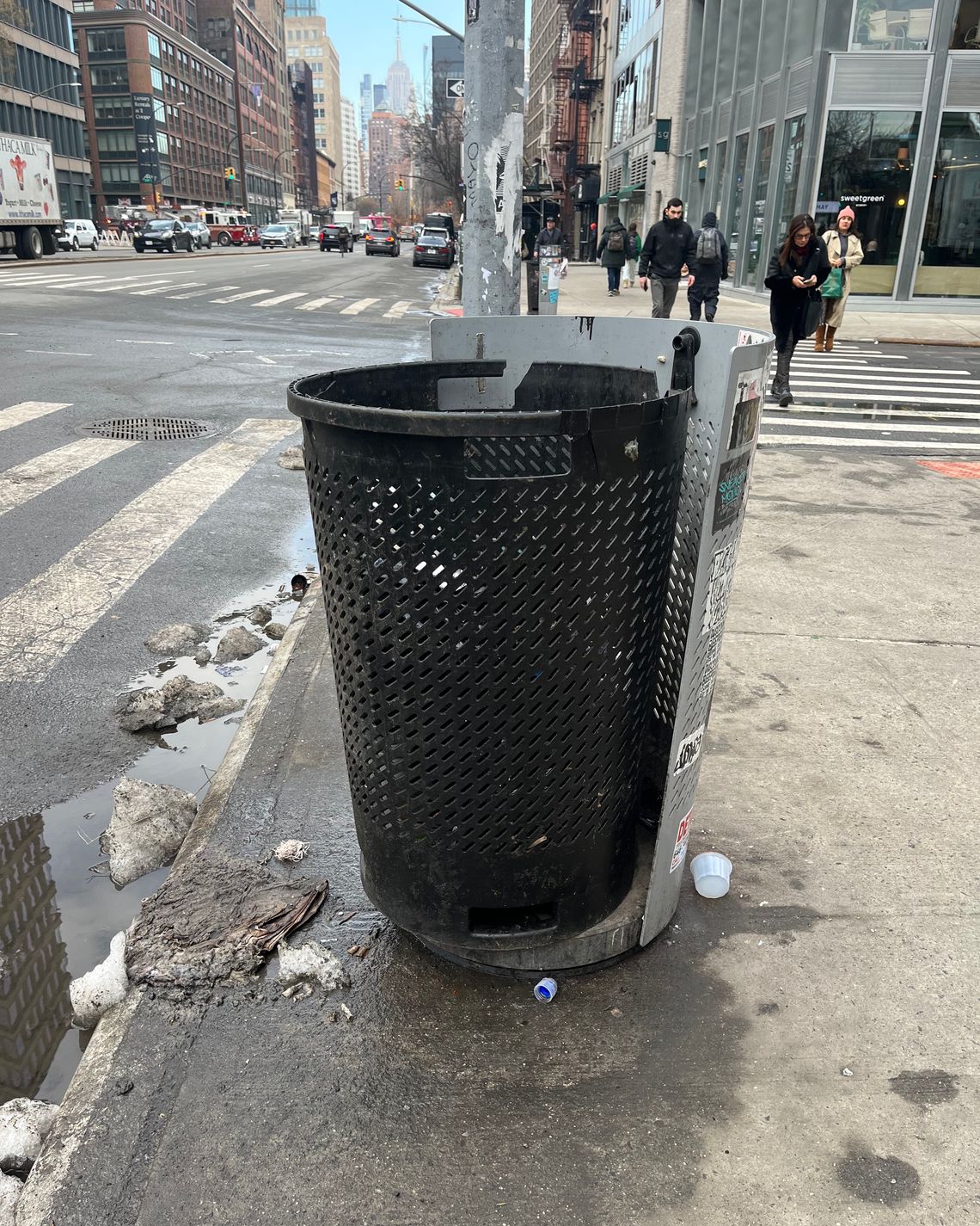 Are the city's new trash cans breaking already?