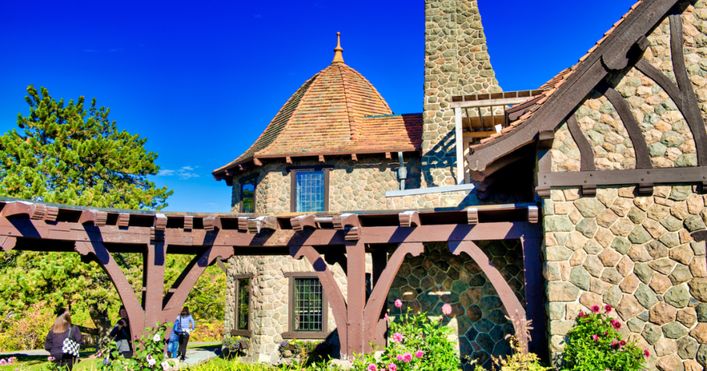 A European-style stone castle in Moultonborough, New Hampshire, with cobblestone exterior and several towers.
