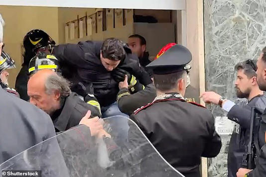 Three masked robbers, one of whom 'was certainly armed', entered a branch of the Credit Agricole bank in Naples at around 11.30am local time
