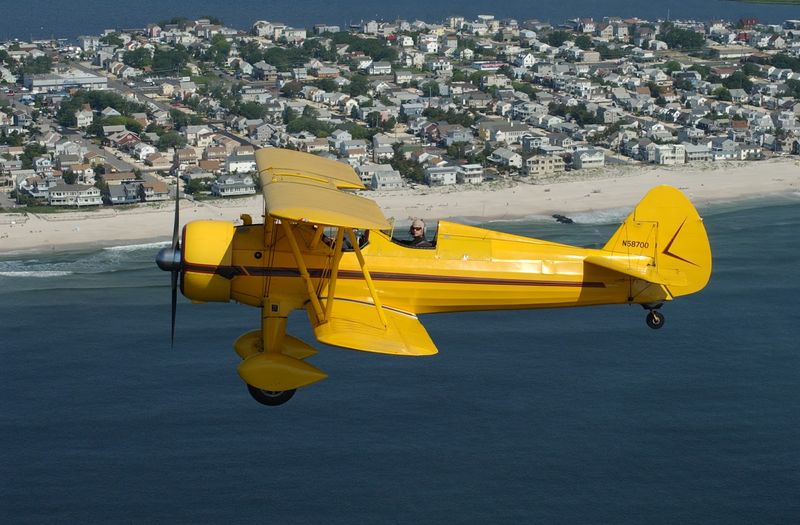 This historic WWII open-cockpit biplane offers the ultimate thrill ride ...