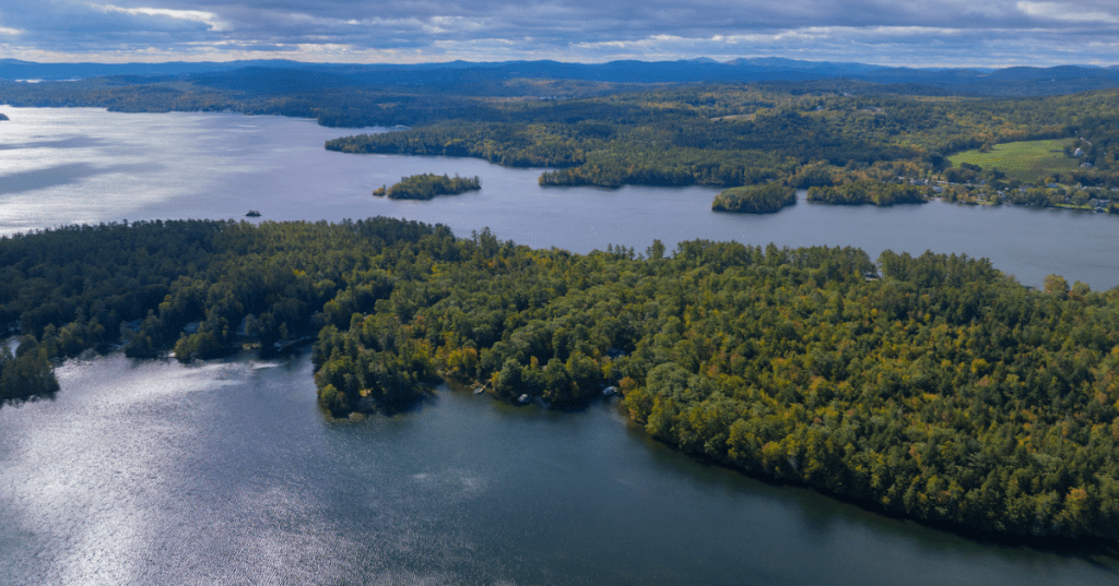 An aerial view of Lake Winnepesaukee, with its islands covered in fall foliage.