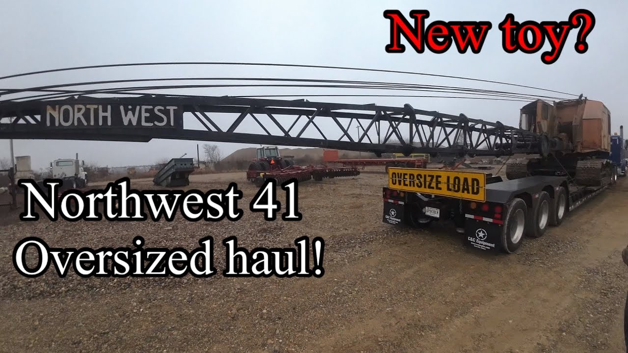 Picking up a Northwest model 41 crawler crane dragline and trucking it ...