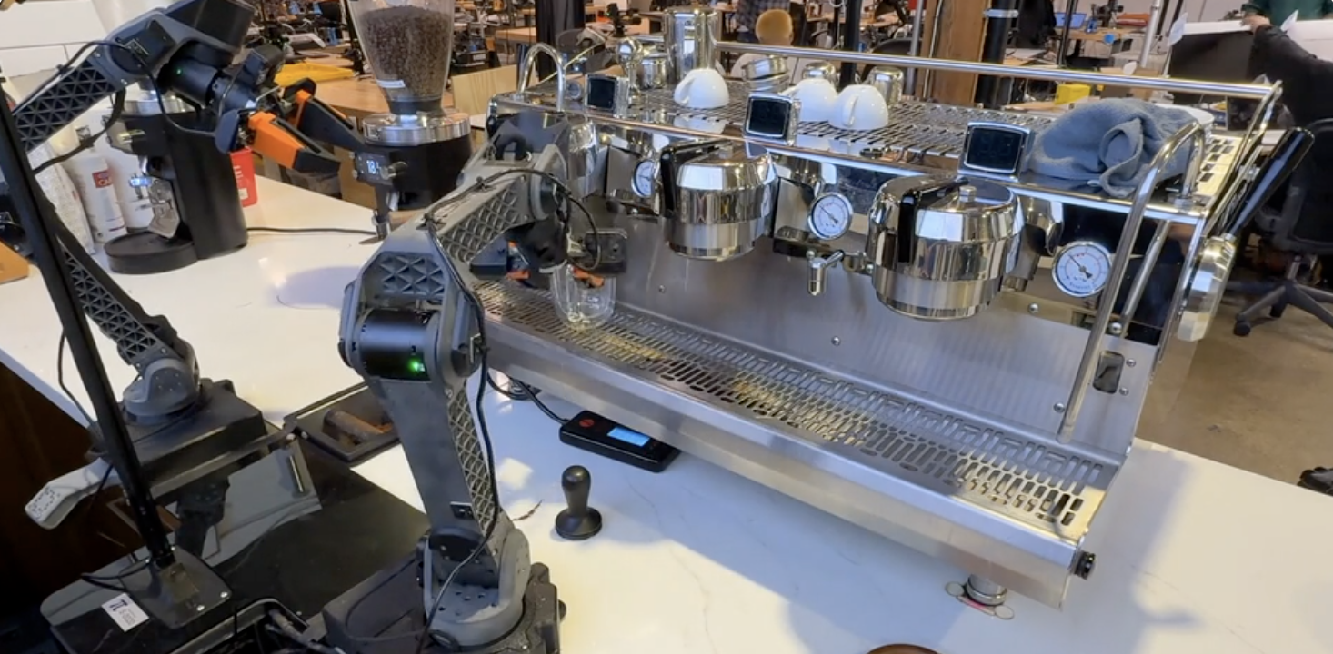 Physical Intelligence, a hot robotics startup, says its new robot brain ...