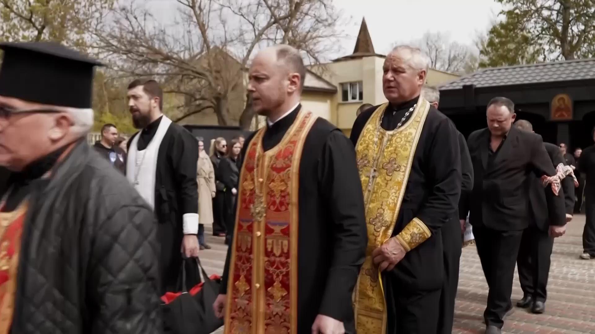 Mourners gather for funeral of eight-year-old boy killed in Russia strike