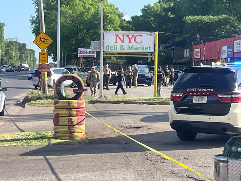 One dead, two critical in targeted shooting at strip mall
