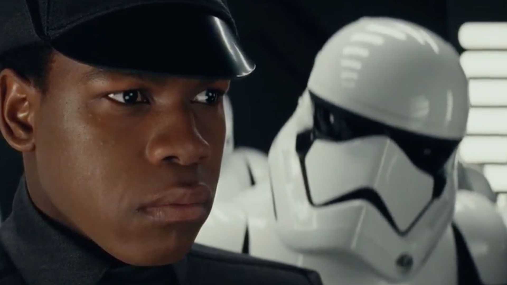 Finn looking nervous as Tom Hardy as a stormtrooper looks over his sholder in a Star Wars The Last Jedi deleted scene