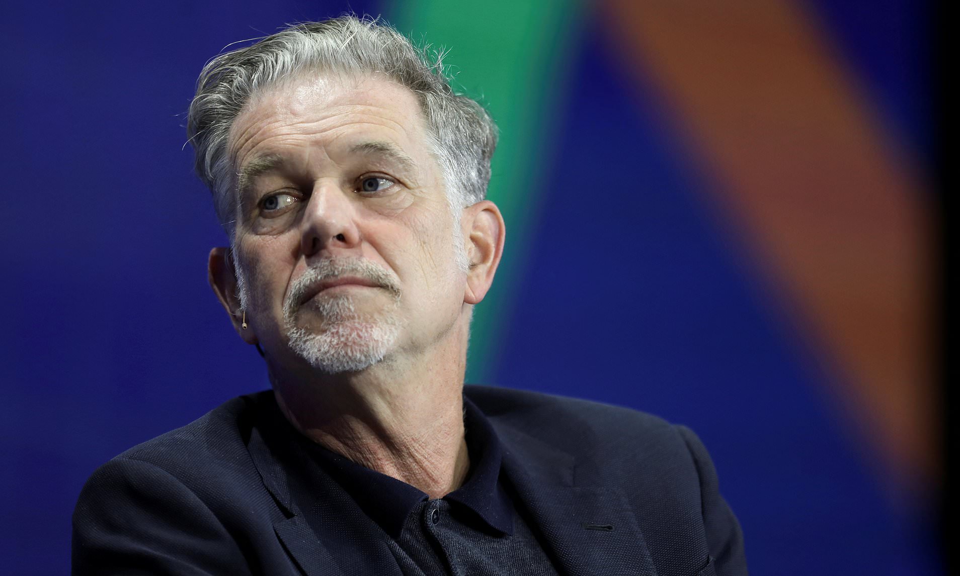 Netflix co-founder steps down - and shares sink despite bumper profits ...